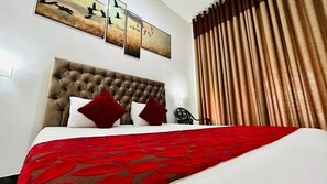 Deluxe driepersoonskamer, balkon | Geluiddichte muren, gratis wifi