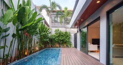 Villa monochrome avec piscine et design