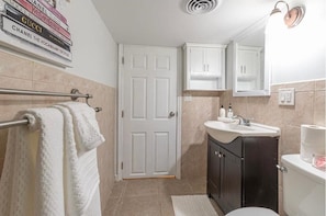 Hair dryer, towels, soap, toilet paper