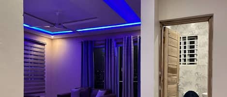 Executive Apartment | Living area | 52-inch flat-screen TV with digital channels, TV