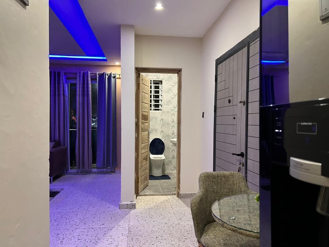 Executive Apartment | Living area | 52-inch flat-screen TV with digital channels, TV