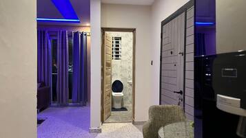 Executive Apartment | Living area | 52-inch flat-screen TV with digital channels, TV