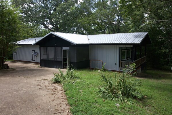Stroll up to the covered porch and enjoy the serene surroundings.