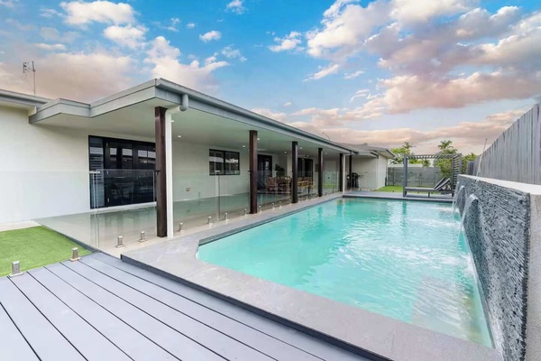 Private swimming pool with covered alfresco area