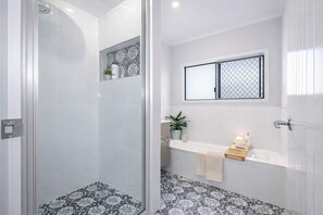 Shower, hair dryer, towels, soap