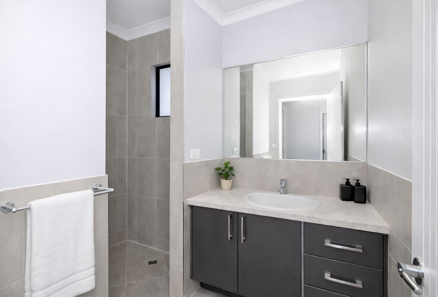 Shower, hair dryer, towels, shampoo