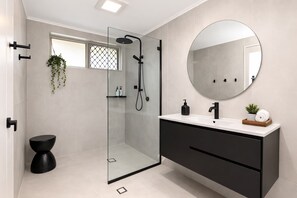Shower, hair dryer, towels