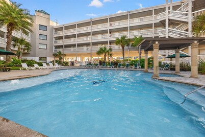 Life's a Beach | Heated Pool | Walk to Beach