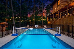 Volleyball, basketball, and a glowing pool — your most active vacation evening starts here. - BirchSquatch · Heated Pool: Putt-Putt, Gameroom, Playset, Sleeps 24! (Broken Bow)
