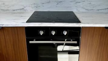 Fridge, stovetop, coffee/tea maker, cookware/dishes/utensils