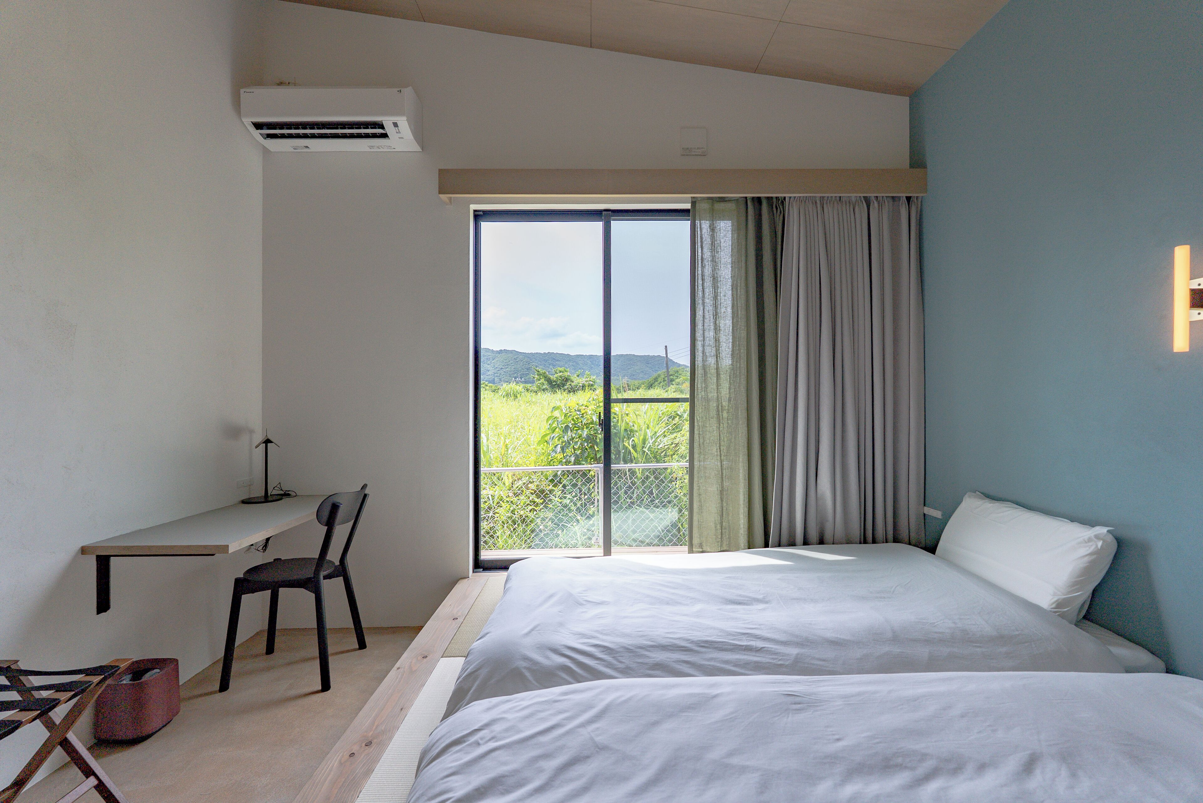 Building B, NS (Each room has 1 semidouble, 1 single futon, 2 single futons in loft, for 8 guests) | 2 bedrooms, free minibar items, iron/ironing board, free WiFi