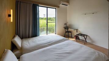 Building B, NS (Each room has 1 semidouble, 1 single futon, 2 single futons in loft, for 8 guests) | 2 bedrooms, free minibar items, iron/ironing board, free WiFi