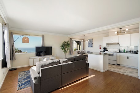 Family Apartment, 2 Bedrooms, Kitchen, Mountain View | Living area | 55-inch LED TV with digital channels