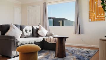 Family Apartment, 2 Bedrooms, Kitchen, Mountain View | Living area | 55-inch LED TV with digital channels