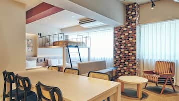 Superior Room | Living area | 65-inch Smart TV with digital channels, Netflix, Hulu