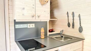 Fridge, toaster, cookware/dishes/utensils