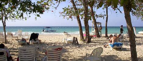 Beach nearby, sun loungers
