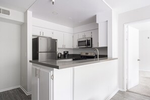 Fridge, microwave, oven, dishwasher