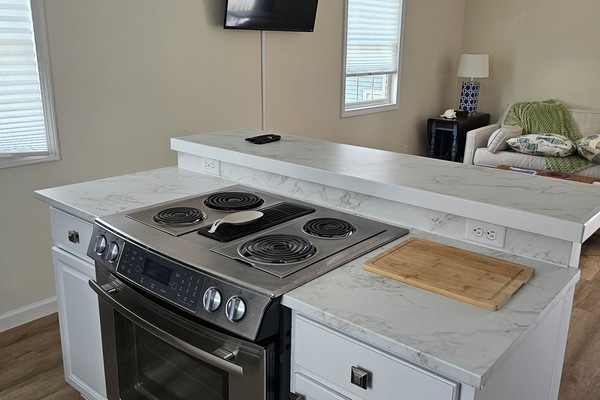 open concept den and kitchen