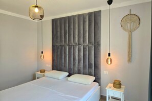 1 habitación, tabla de planchar con plancha, wifi gratis y ropa de cama