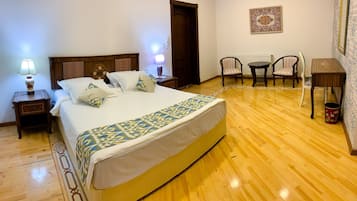 Superior Double Room, City View | Desk, laptop workspace, blackout drapes, iron/ironing board