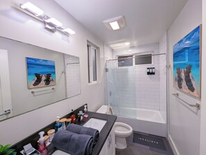 Hair dryer, towels, soap, shampoo