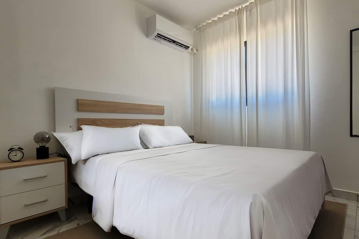 2 habitaciones, caja de seguridad en la habitación y cortinas blackout