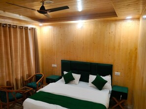 Deluxe Suite, Hill View | 3 bedrooms, in-room safe, laptop workspace, blackout drapes - Harsiwoodstone woodstone orchardstay (Bhatwari)