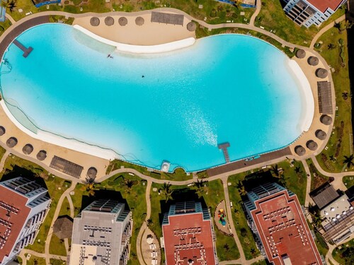 Apartment in Mazatlan's largest swimming pool, lagoon with artificial beach