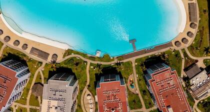 Apartment in Mazatlan's largest swimming pool, lagoon with artificial beach