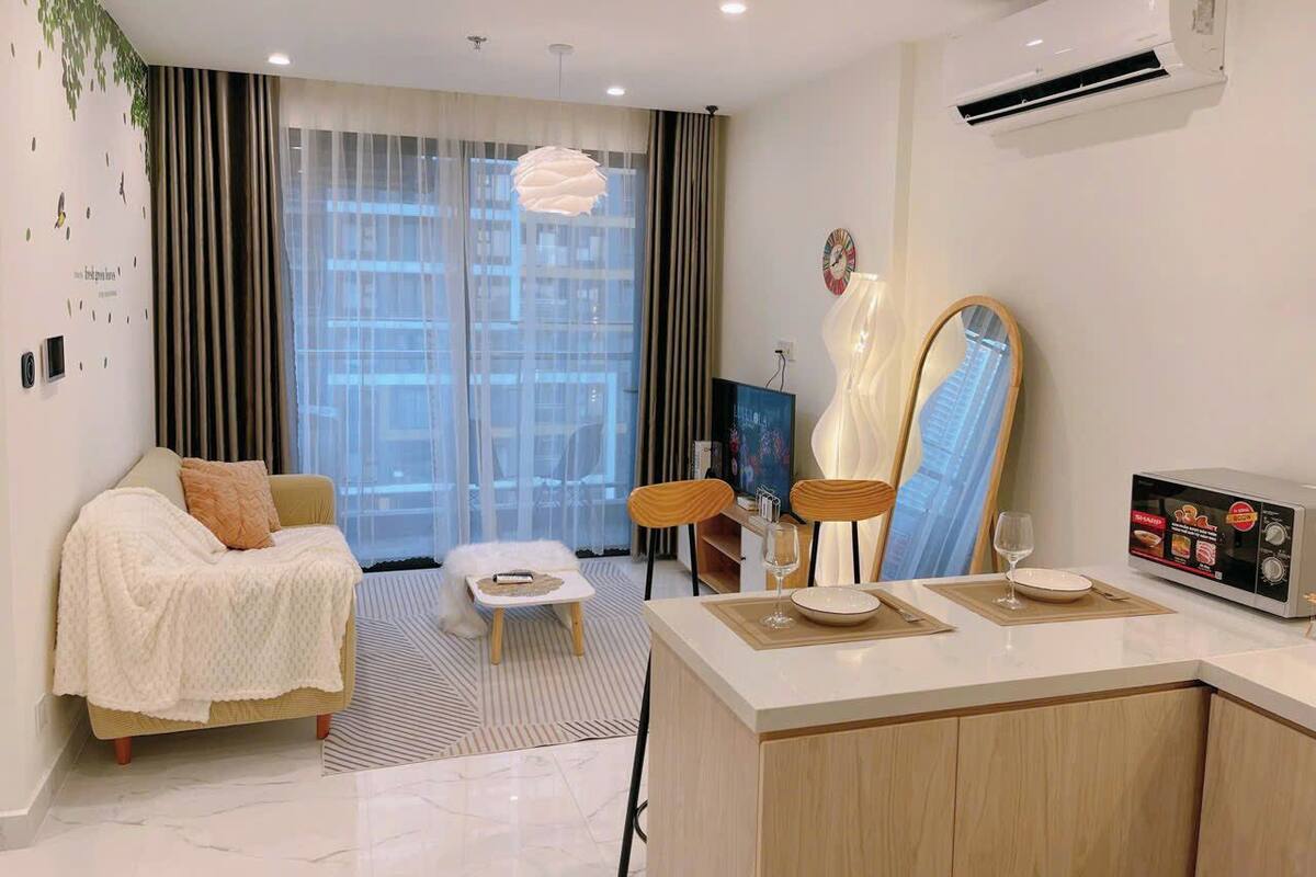 Standard Apartment, Balcony | Living area | 60-inch flat-screen TV with cable channels