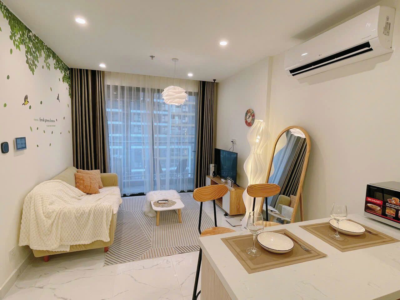 Standard Apartment, Balcony | Living area | 60-inch flat-screen TV with cable channels