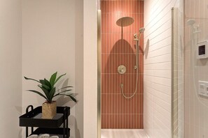 Shower, eco-friendly toiletries, hair dryer, towels