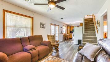 TV, fireplace, books