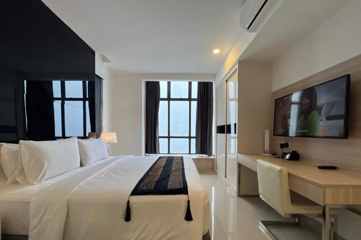 In-room safe, desk, laptop workspace, blackout curtains