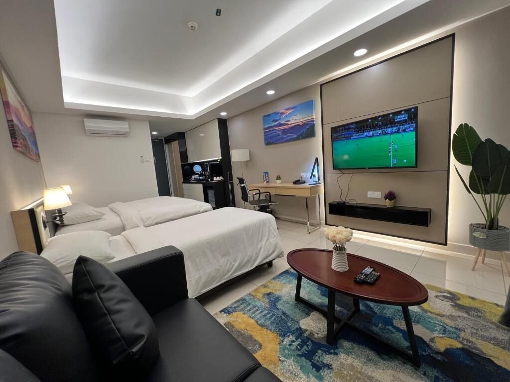 Studio (King Suite) | Een kluis op de kamer, een bureau, een laptopwerkplek