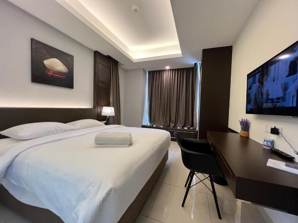 Superior kamer, 2 slaapkamers | Een kluis op de kamer, een bureau, een laptopwerkplek