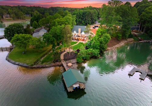Lake Views with Firepit & Dock Access | Spacious Waterfront Home by AvantStay