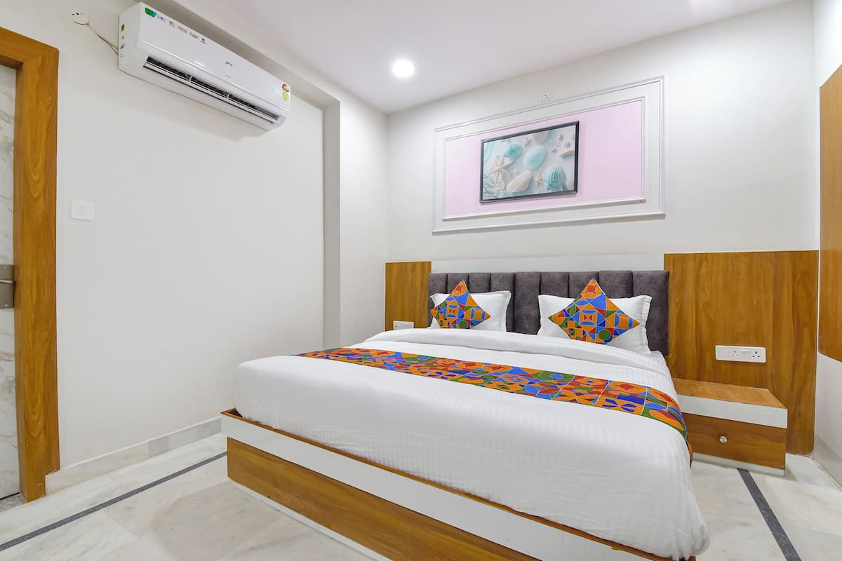 Deluxe kamer | Lakens van Egyptisch katoen, luxe beddengoed, een kluis op de kamer