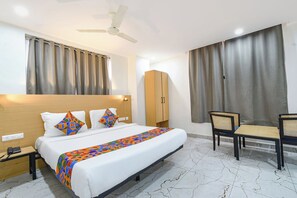 Deluxe kamer | Lakens van Egyptisch katoen, luxe beddengoed, een kluis op de kamer