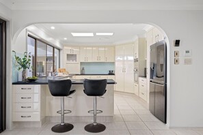 Fridge, microwave, oven, stovetop - Relfections at Newport 5Bedroom Pool and Canal Living (Newport)