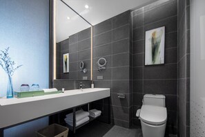City Double Room | Bathroom | Shower, free toiletries, hair dryer, bathrobes - SSAW Pagoda Hotel Qingdao West Coast (Qingdao)