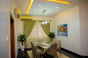 Family Apartment, Balcony, City View | Dining room