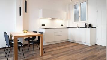 Departamento, en edificio contiguo | Cocina privada