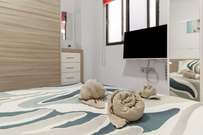 1 habitación, tabla de planchar con plancha, wifi gratis y ropa de cama 