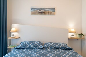 3 habitaciones, tabla de planchar con plancha, wifi y ropa de cama
