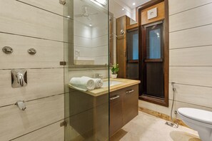 Deluxe Apartment | Bathroom - Geet by Akama Homes (New Delhi)