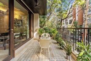 Deluxe Apartment | Balcony - Geet by Akama Homes (New Delhi)