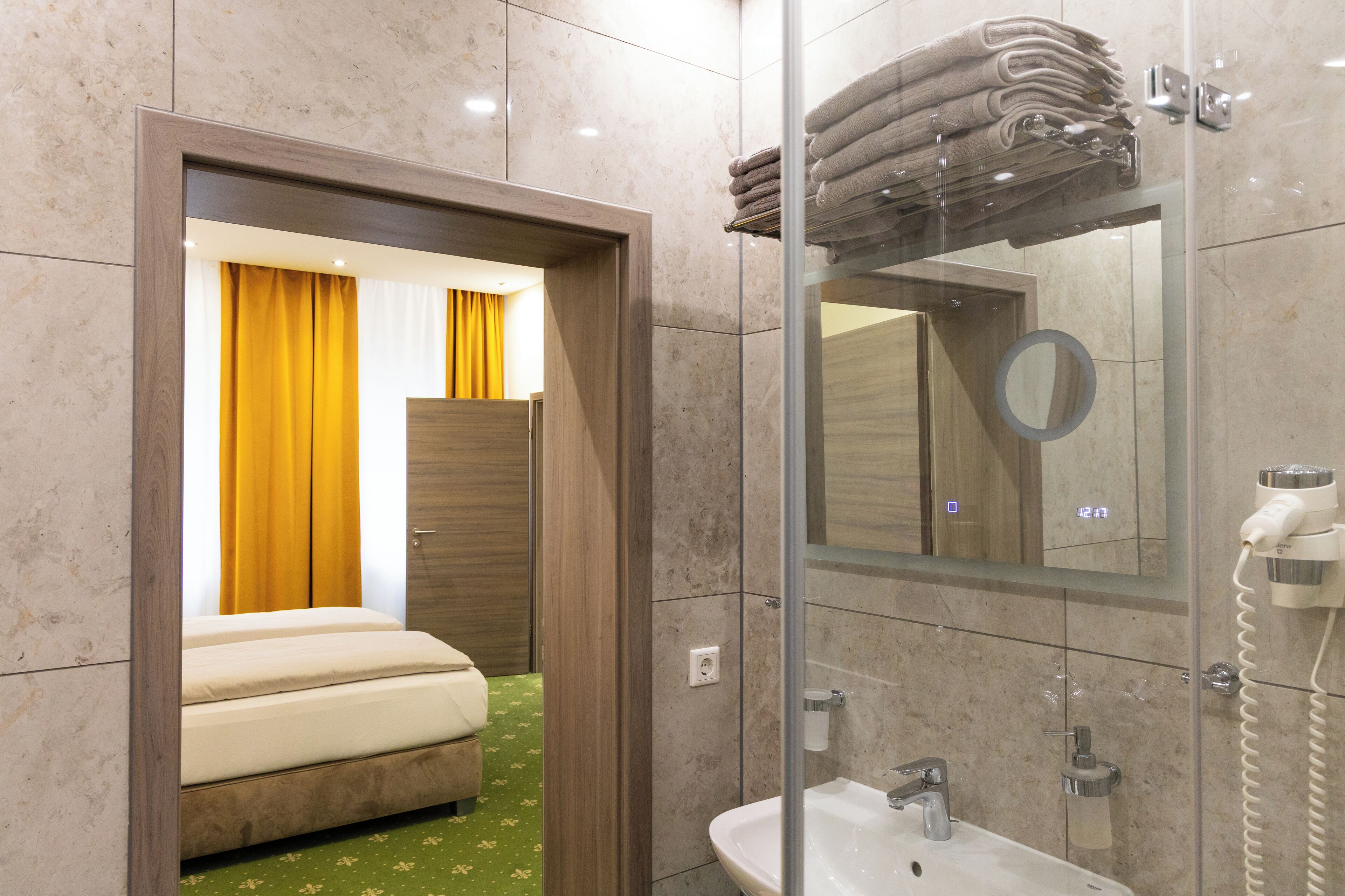 Hair dryer, towels, soap, shampoo