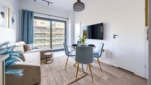 Apartment (68) | Living area | Flat-screen TV - Apartamenty Sun & Snow Hevenia (Mrzezyno)